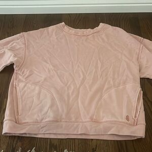 Free people movement light pink sweatshirt with pockets size large
